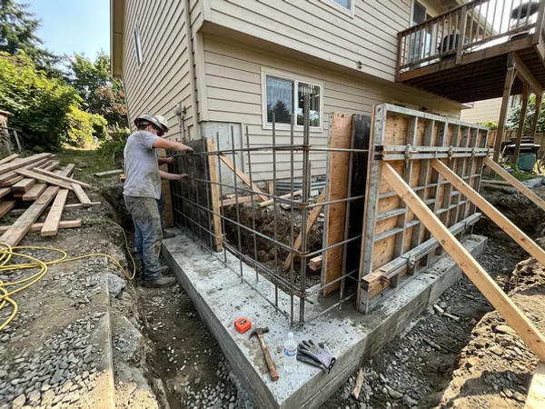 Illustration of new rebar and forms for replacement walls